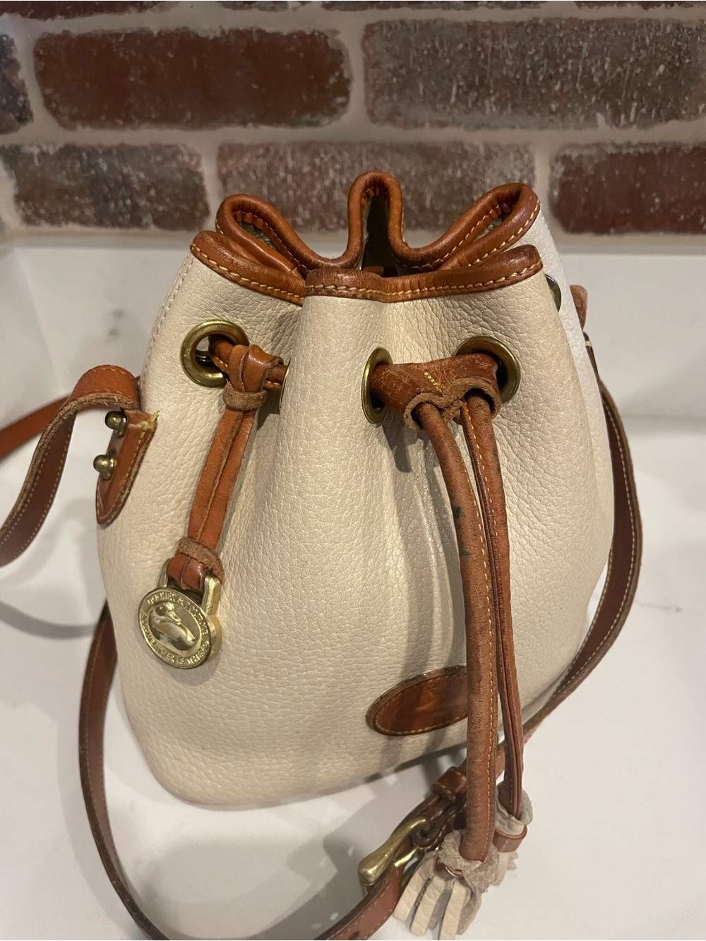Vintage Dooney & Bourke Cream and Brown Pebbled Leather Drawstring Crossbody - Picture 2 of 6
